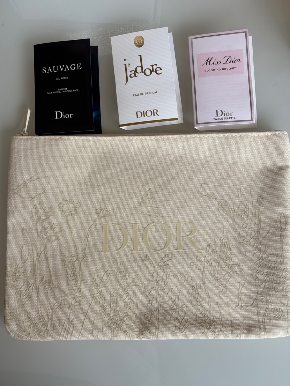 Dior Canvas Cosmetic Pouch and perfume